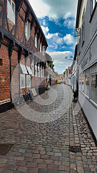 Street with old houses in a town in Denmark