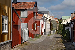 Street in the old part of Vasteras town with traditional wooden