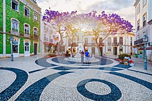 Street in the old town in the center of Lagos, Algarve region, Portugal. Narrow street in Lagos, Algarve, Portugal. Streets in the photo