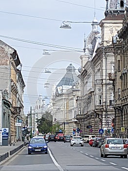 A street in the old town with the Palace of Culture in the background- Arad county - Romania