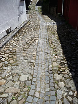 Street in the Old town of Sighisoara. Romania.