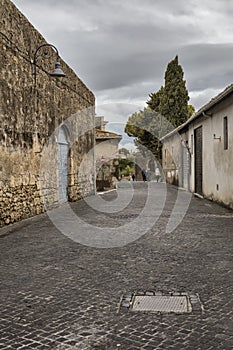 Street in old town in Tarquinia, Lazio, Italy.