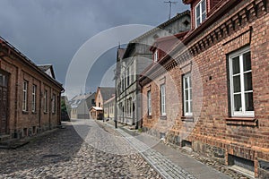 Street with old wooden colorful houses in old town of Viljandi