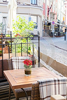 Street outdoor cafe with nature decoration