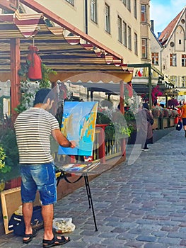 Painter Artist Life stile Street Cafe Lifestyle Tourist In the Old Town of Tallinn 2019,17.06 Summer in Estonia Europe rick