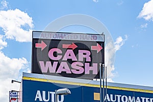 Street photography, Brooklyn NYC. Close up Car Wash sign oxymoron