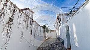 Street in the popular neighborhood of Albaicin in the city of Granada, in Andalusia, Spain