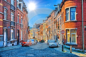 Street with red brick houses in Liege, Belgium, Benelux, HDR