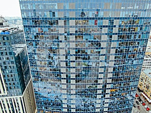 Street reflection on glass steel building facade