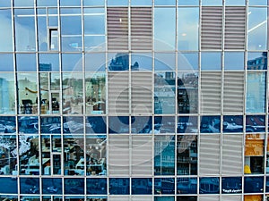 Street reflection on glass steel building facade