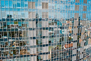 Street reflection on glass steel building facade