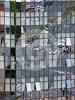 Street reflection on glass steel building facade