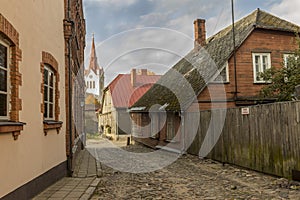 Street with residential houses in the old town of Cesis