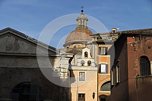 Street of Rome and church with bells