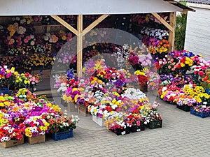 Street sale of artificial plastic flowers for Easter or Radunitsa