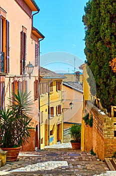 Street in Santarcangelo di Romagna on sunny day photo