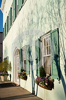 Street scene in the historic southern city of Charleston South Carolina with typical homes in view