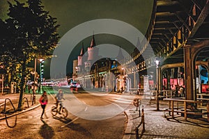 Street scene at night in Berlin, Kreuzberg at OberbaumbrÃ¼cke Oberbaum Bridge