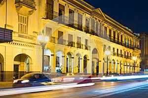 Street scene in Old Havana illuminated at night