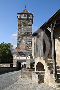 Street scene with Roder tower and steps up to the old city wall photo