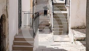 Street scene with steps in Monte Sant`Angelo, on the Gargano Promontory in Puglia, southern Italy.