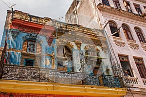 Street scene with traditional colorful buildings in downtown Havana. Cuba