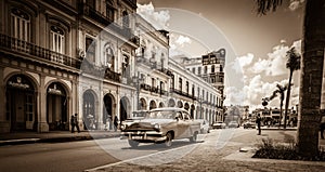 Street scenery on the main street with drive American vintage cars in Havana Cuba - Retro Serie SEPIA Cuba Reportage