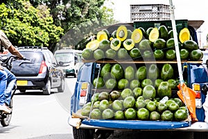 Street sell of avocado at an old car at El Cerrito on the Valle del Cauca region in Colombia