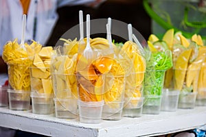 Street sell of mango in the city of Cali in Colombia