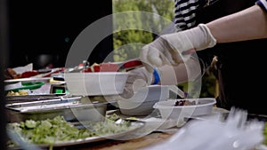 Street Seller Weighs Pieces of Kebab, Salad in Lunch Box on Electronic Scales.