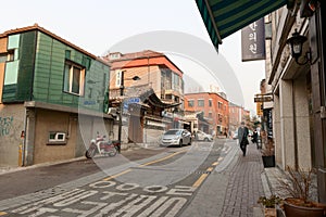 Street in Seoul with traditional and modern houses