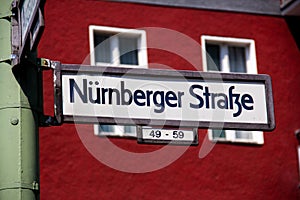 A street sign in Berlin, Germany, with the name NÃ¼rnberger Strasse, on it