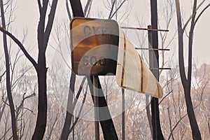 A street sign burnt by bushfire in The Blue Mountains in Australia