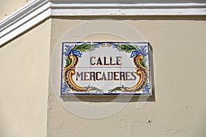 The street sign of Calle Mercaderes photo