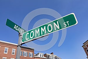street sign common street and adams street in Boston