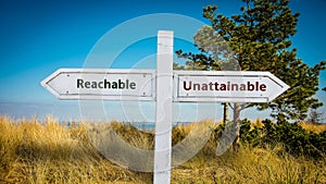 Street Sign to Reachable versus Unattainable photo