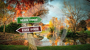 Street Sign Slow versus Fast Food