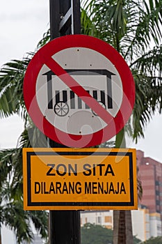 Street sign forbidding street food stands in Kuala Lumpur