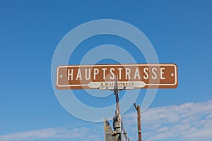 street sign hauptstrasse, in english main street in the small western village of Boerne, Texas