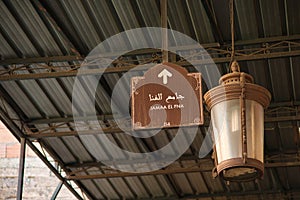 Street sign indicating the direction towards the Jemaa El Fna square, Marrakech, Morocco