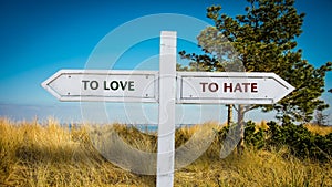 Street Sign LOVE versus TO HATE
