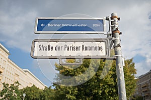 Street sign of the Pariser Kommune street in Berlin, Germany photo