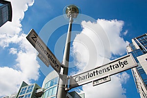 Street sign pointing to Zimmerstrasse and Charlottenstrasse
