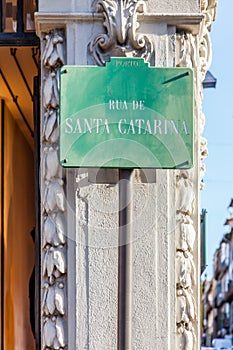 A street sign showing Rua de Santa Catarina