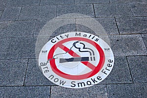 Street sign of smoke-free city malls in Australia photo