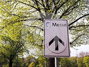 Street sign to the Messe or international fair in Hannover, Ger photo