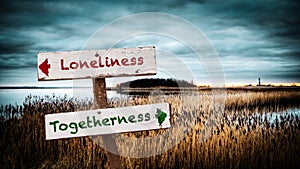 Street Sign Togetherness versus Loneliness