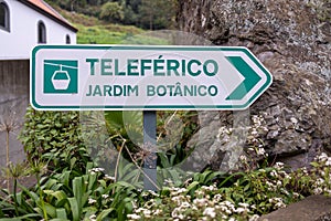 Street sign in the town of Funchal in Madeira Island in Portugal, showing a sign for the cable cars