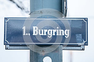 Street sign of Vienna, Austria, indicating the Burgring. It is part of the Ringstrasse, a system of ring roads and streets