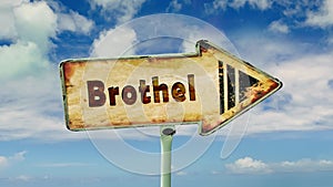 Street sign the way to brothel